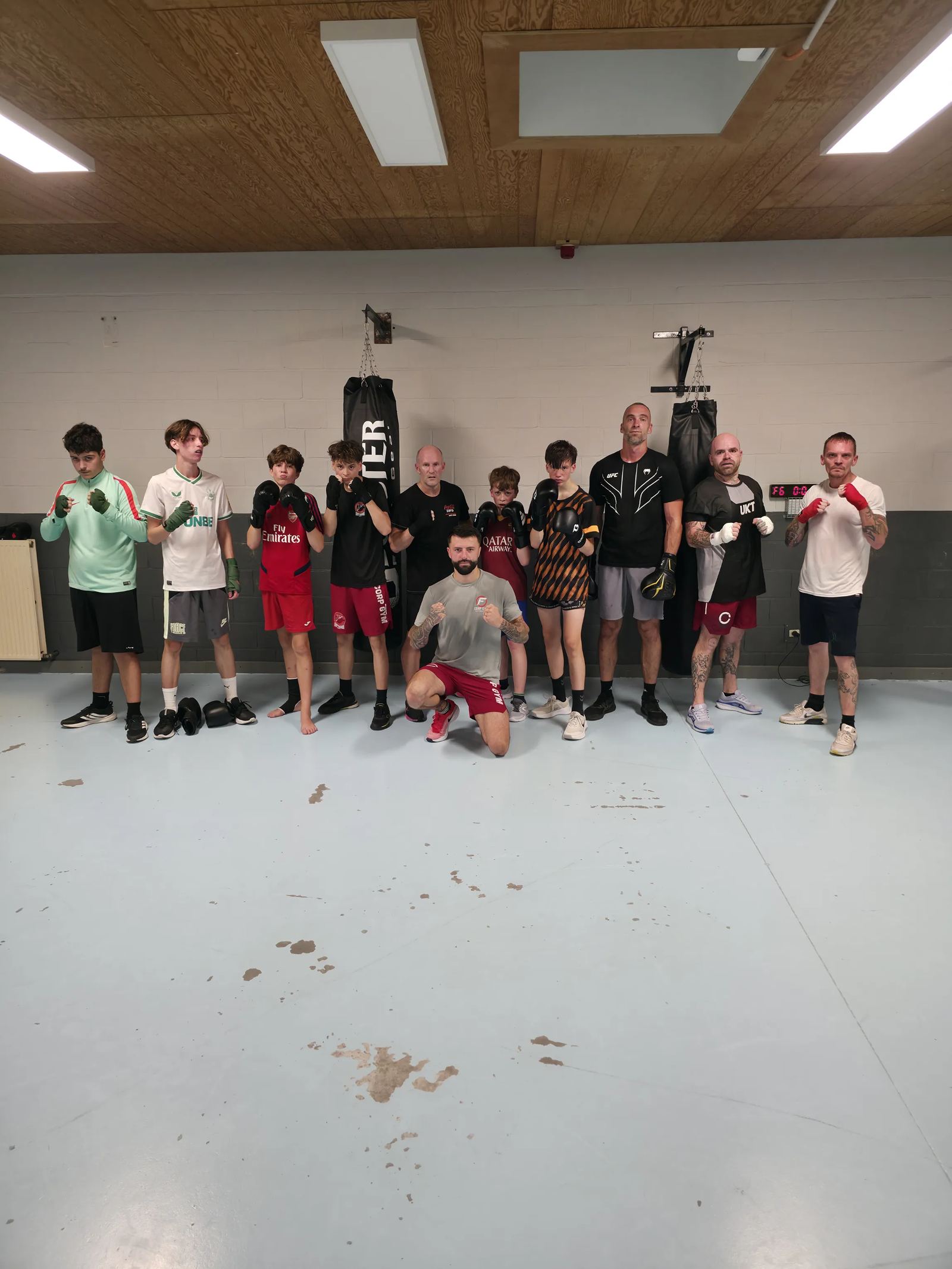 Coach et combattant en compétition